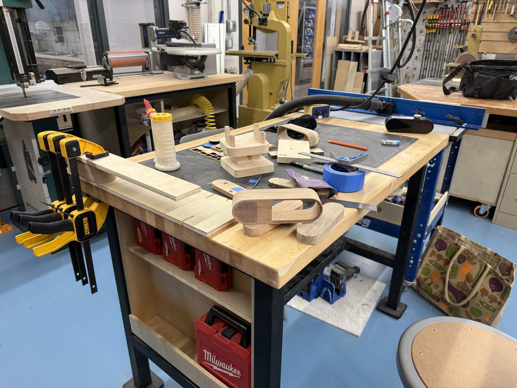 Hand-shaping the DAWN wooden housings on the workbench