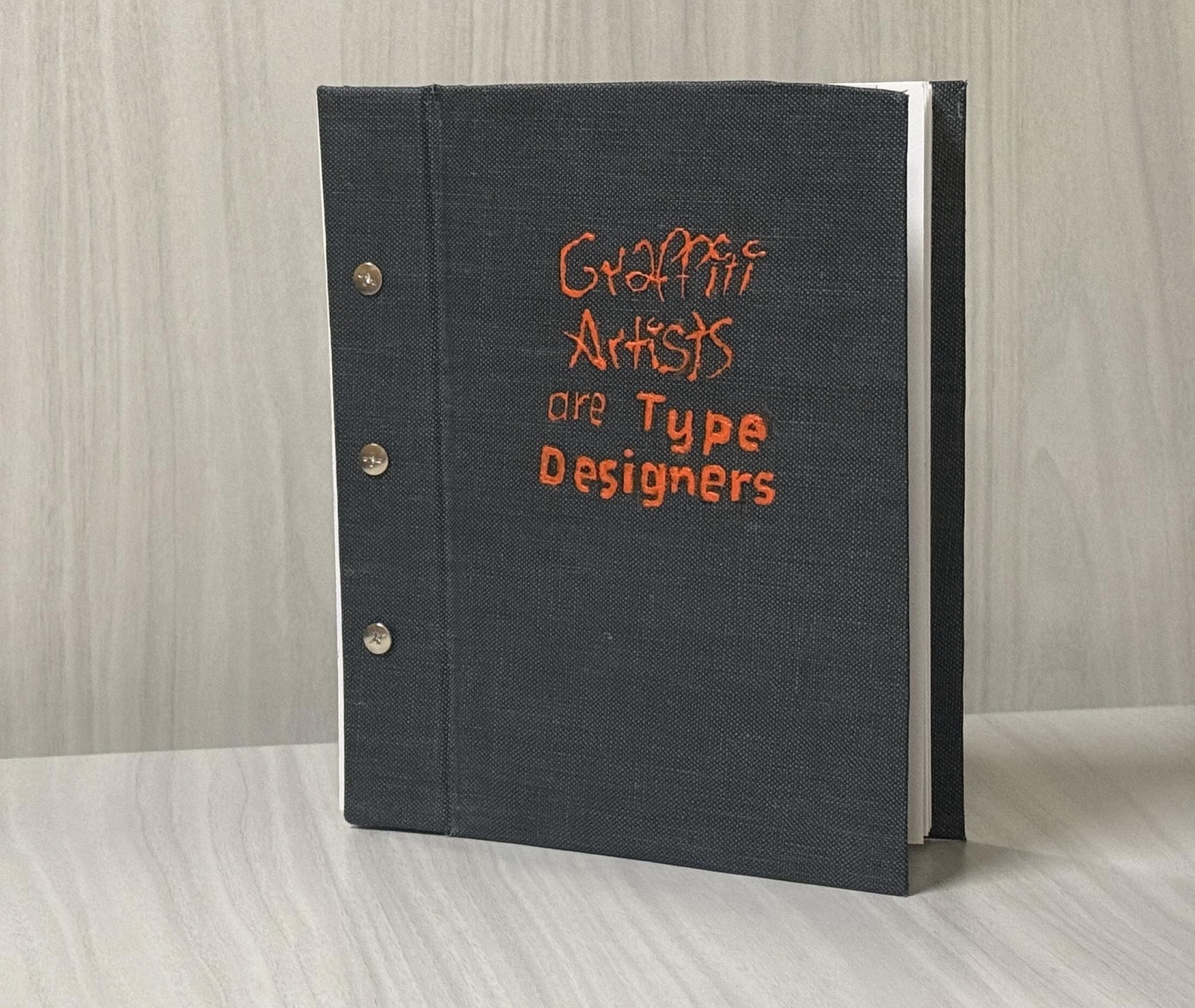 Finished book — acrylic cover detail